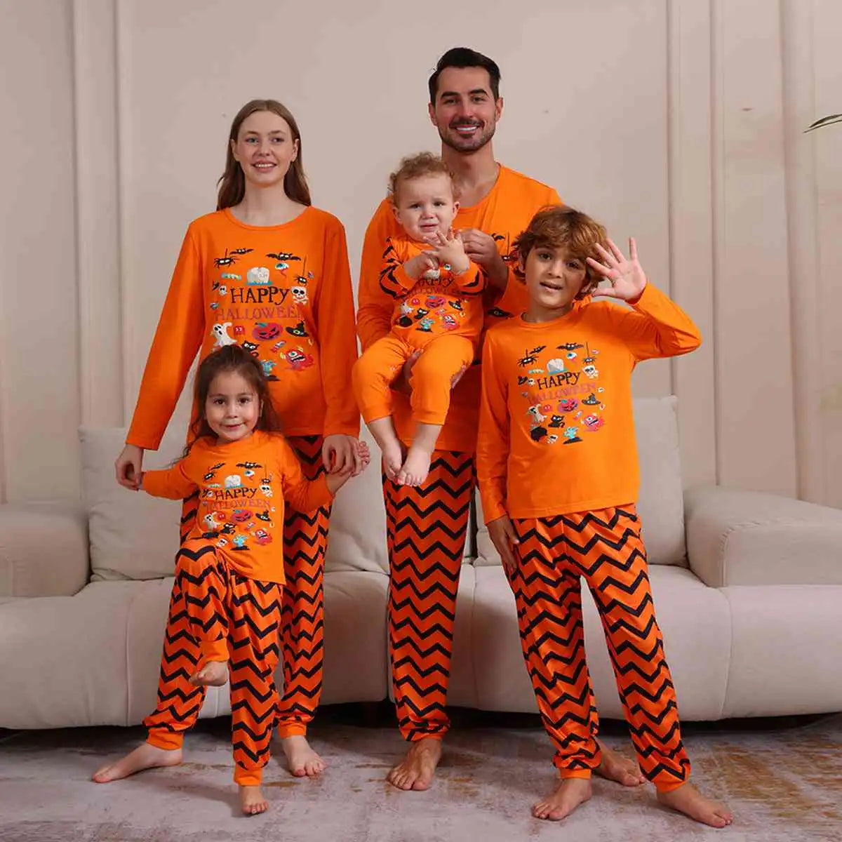 Matching apologized halloween pajamas for family