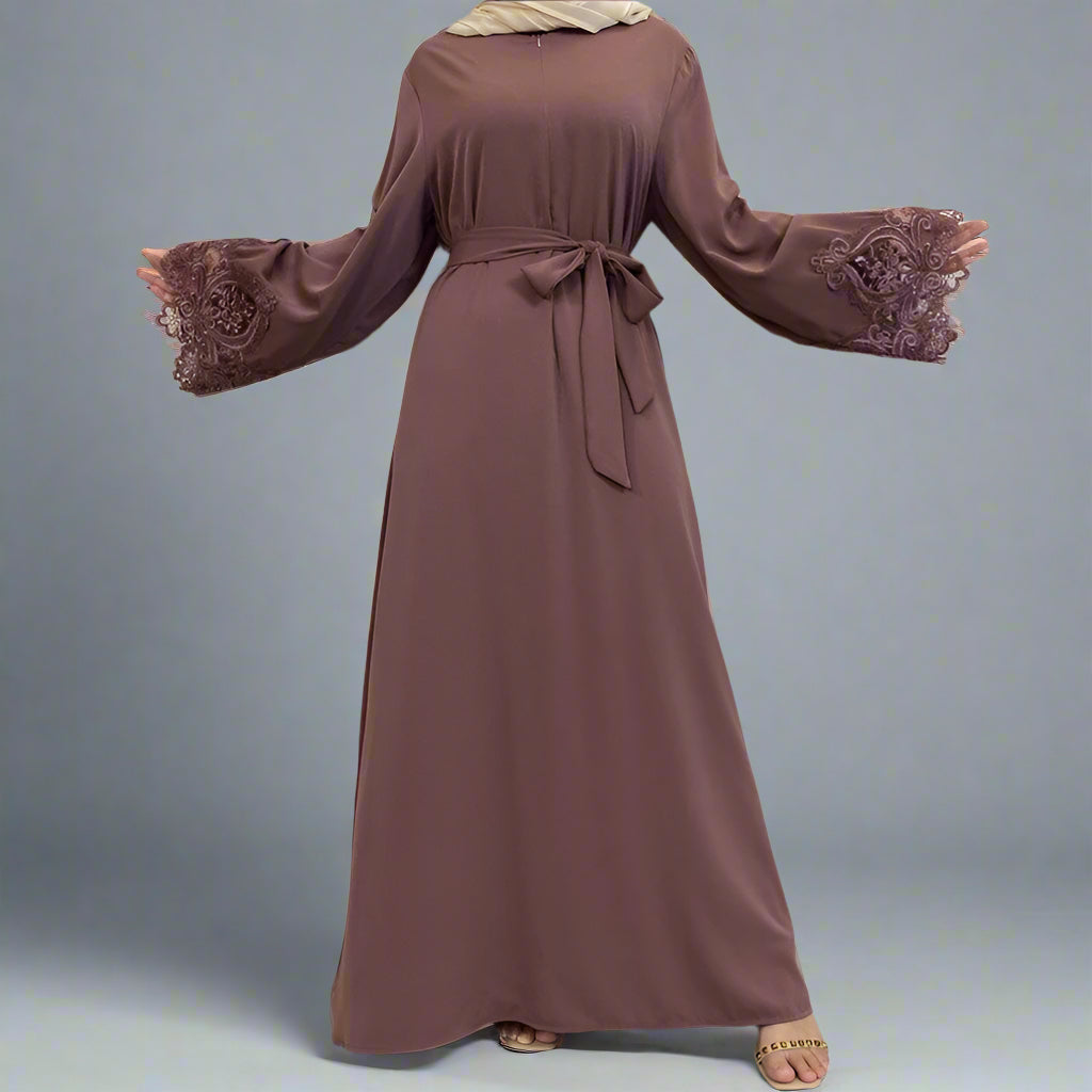 Trendy Abaya made from Nida fabric with a flared hem for a feminine touch In Color Light brown
